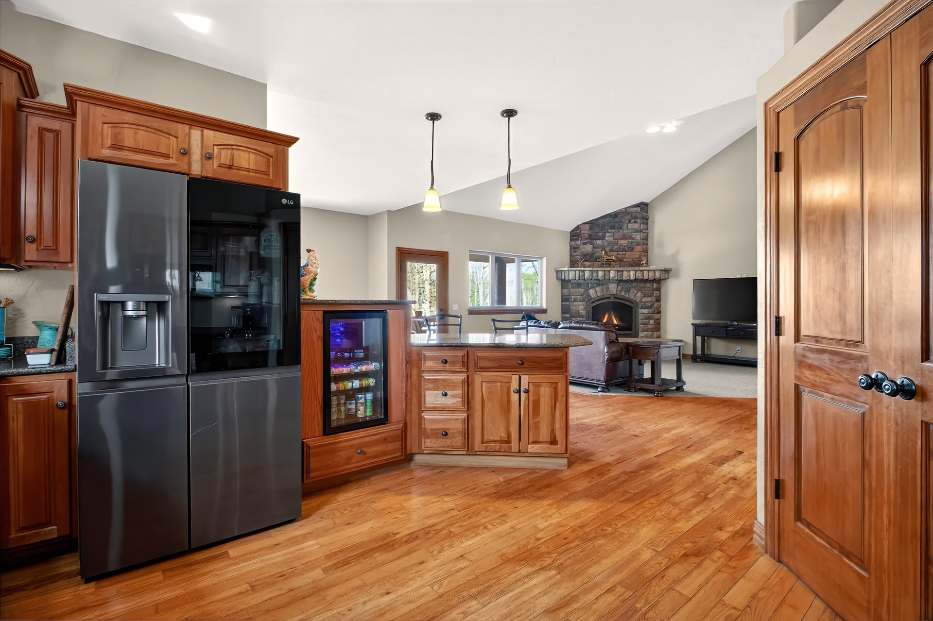 Kitchen with custom wood cabinetry and island